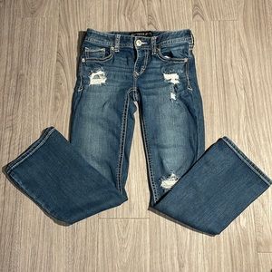 Express distressed boot cut low rise jeans